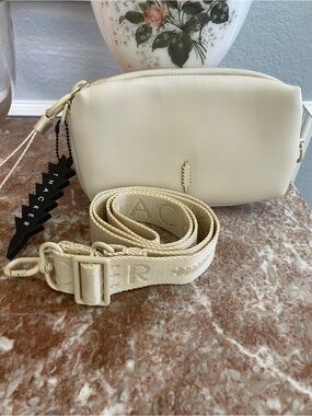 Thacker Light Cream Crossbody Bag with Branded Wide Strap